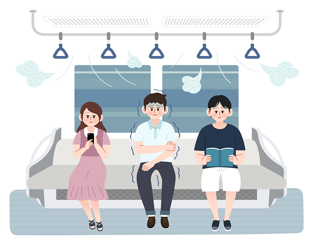 리모콘으로 에어컨 온도를 조절하는 그림