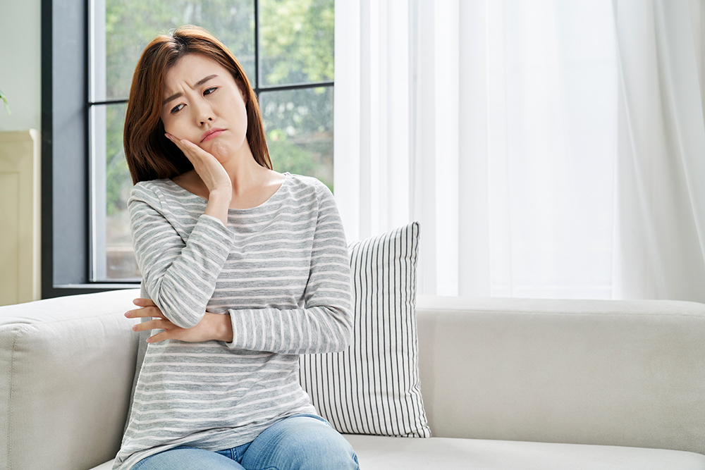 입이 아픈 여성